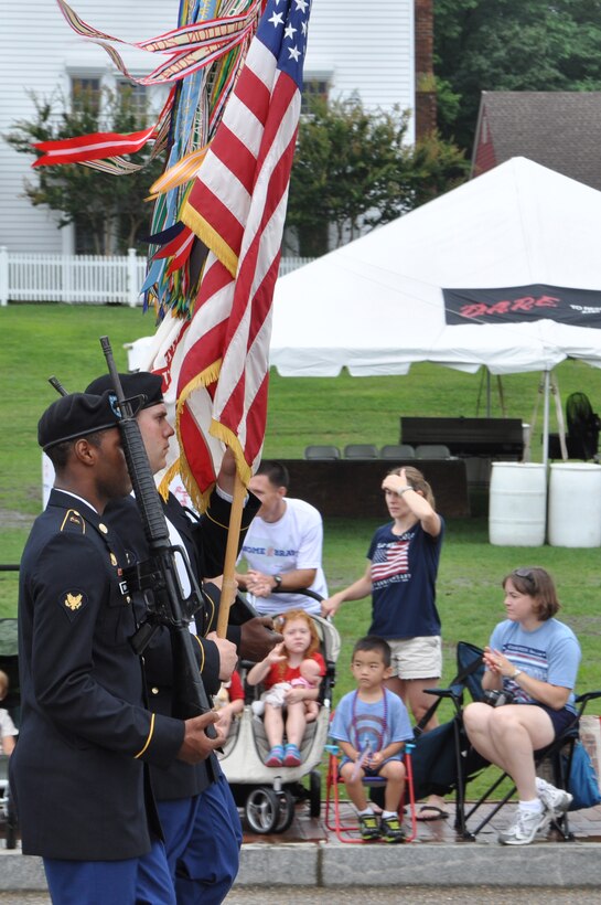 The U.S. Army 567th Inland Cargo Transfer Company, 53rd Transportation Battalion, 7th Sustainment Brigade Expeditionary Color Guard marches during the 35th Annual Fourth of July Celebration in Yorktown, Va., July 4, 2015. Each military branch of service was represented in the town’s annual Independence Day parade. (U.S. Air Force photo by Master Sgt. April Wickes/Released)