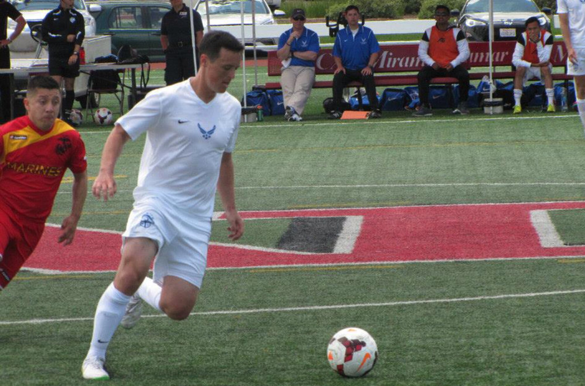 Staff Sgt. Miles Gravage, 748th Aircraft Maintenance Squadron activity security manager, dribbles the ball during the 2015 Armed Forces Championship title match in Marine Corps Air Station Miramar, Calif., May 12-21. The Air Force played against Army, Navy and Marine Corps teams to earn 2nd place with a 2-2 final record.(Courtesy photo)