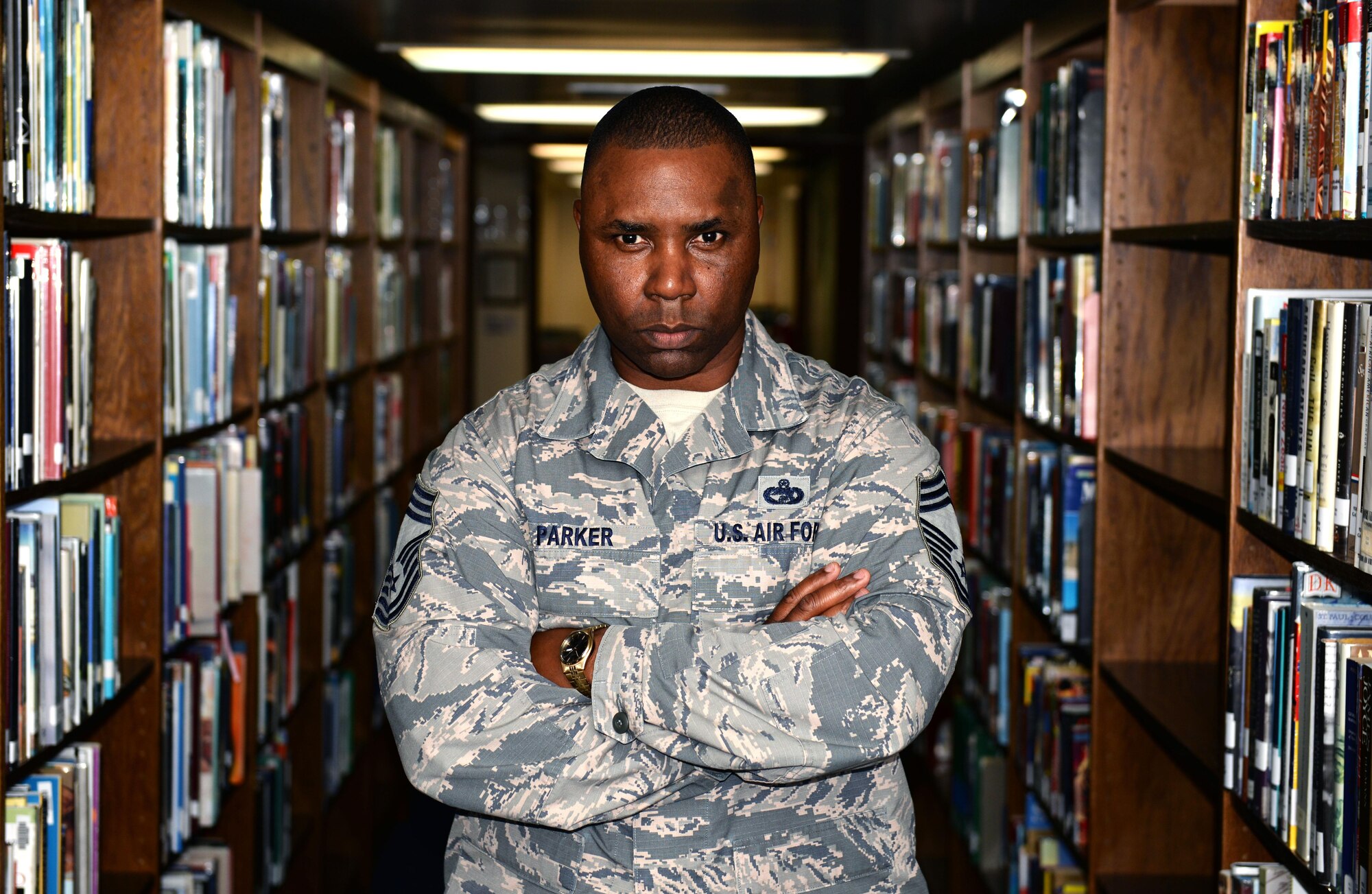 Chief Master Sgt. Marvin Parker, 36th Mission Support Group superintendent, holds a doctorate in business administration, summa cum laude. Since completing his transportation management Community College of the Air Force degree in 2003, Parker hasn’t stop pursuing higher education and hopes to motivate other Airmen to follow his example. (U.S. Air Force photo by Senior Airman Alexander W. Riedel/Released)