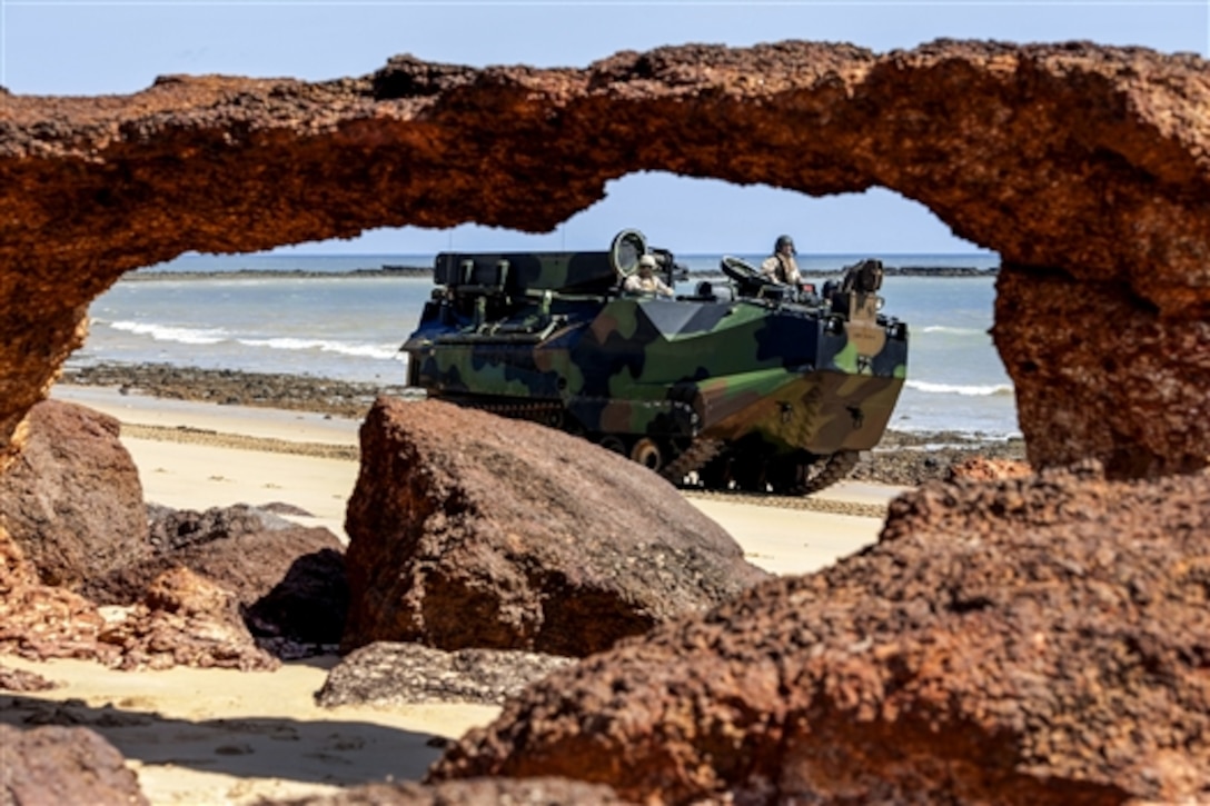 U.S. Marines practice an amphibious assault in amphibious vehicles during Talisman Sabre 2015 at Fog Bay, Australia, July 8, 2015. The biennial exercise enables nearly 30,000 U.S. and Australian defense forces to conduct operations to increase their ability to plan and execute operations from combat missions to humanitarian assistance efforts. The Marines are assigned to 2nd Battalion, 5th Regiment.