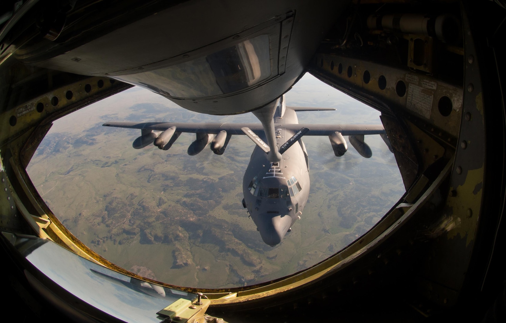 A U.S. Air Force KC-135 Stratotanker assigned to the 185th Air Refueling Squadron refuels a MC-130J Combat Talon assigned to the 58th Special Operations Wing during a final training mission of the 185 ARS June 30, 2015. The 185 ARS will be transitioning to Air Force Special Operations Command.