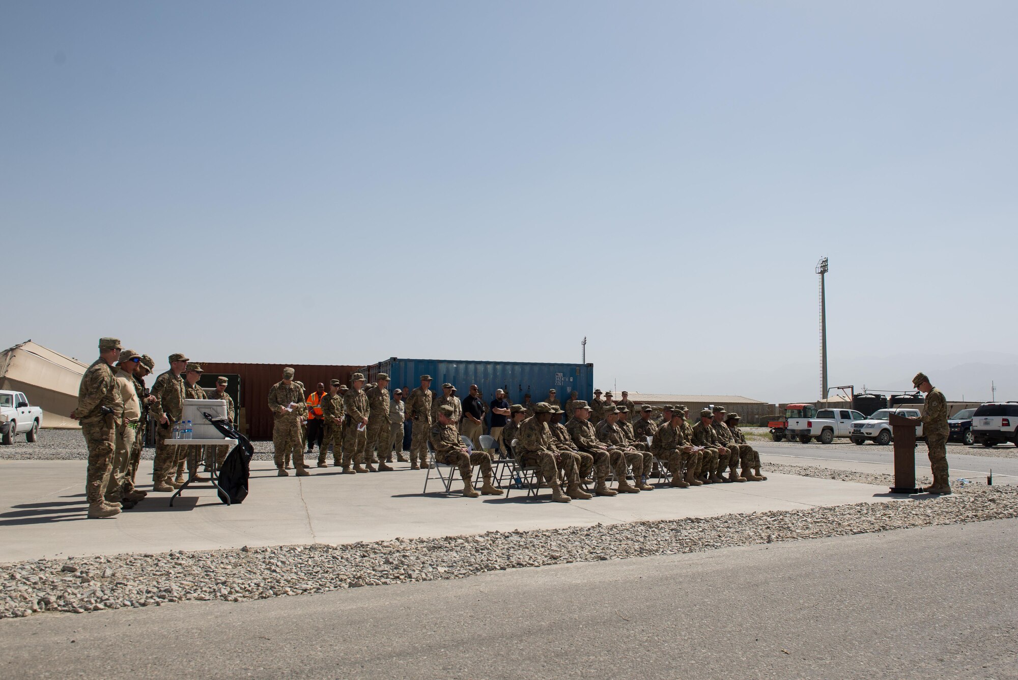 U.S. Air Force Master Sgt. Jason Bowman, 455th Expeditionary Logistics Readiness Squadron, speaks during the MSgt Randy Gillespie road dedication ceremony at Bagram Airfield, Afghanistan, July 9, 2015. Gillespie was a career fuels specialist who died July 9, 2007, from wounds sustained during small arms fire near Herat, Afghanistan. (U.S. Air Force photo by Tech. Sgt. Joseph Swafford/Released)