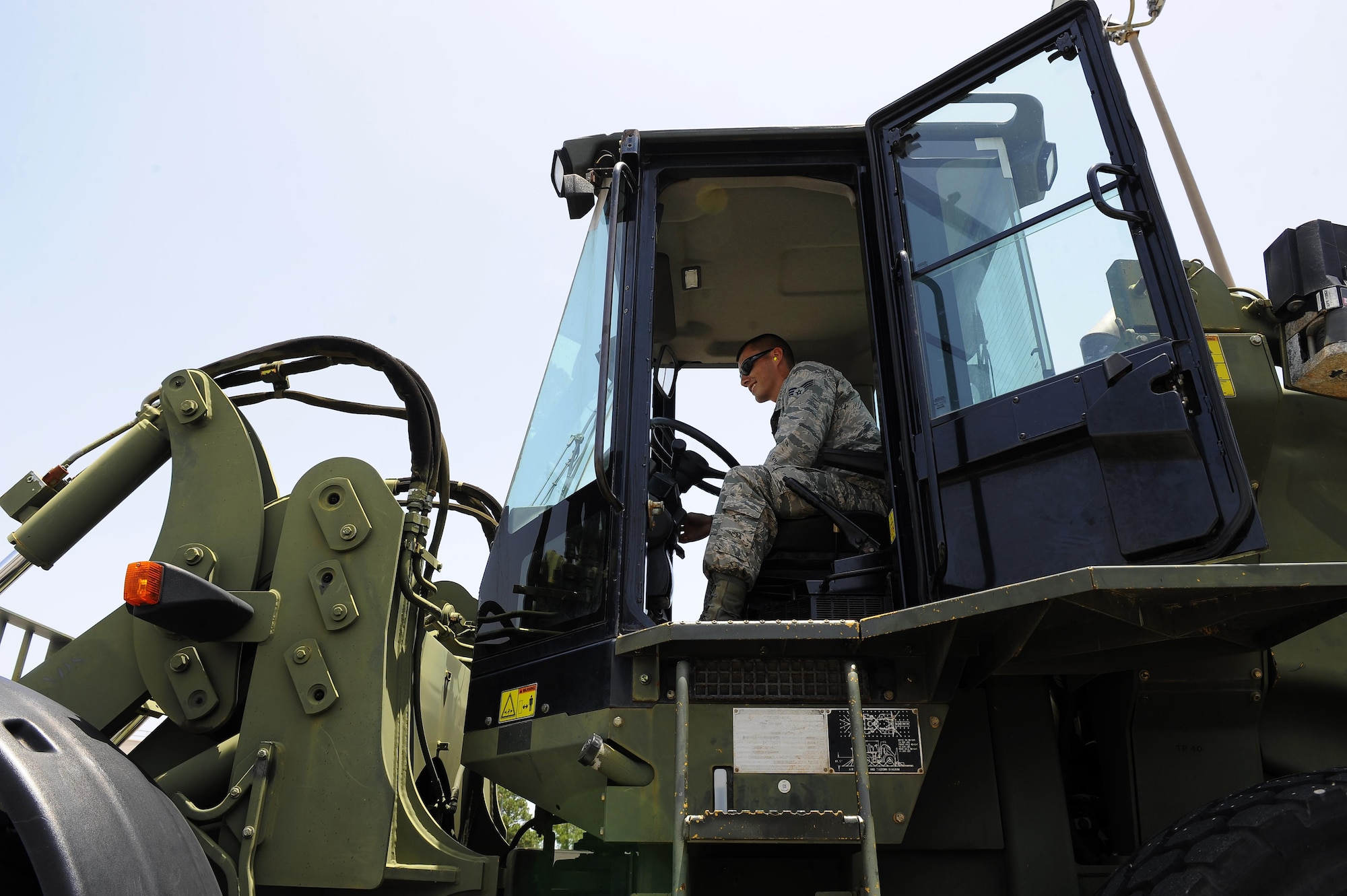 Senior Airman Daniel Dennison, 1st Special Operations Logistics Readiness Squadron vehicle operator, drives a 10K all-terrain fork lift at Hurlburt Field, Fla., July 7, 2015. The Vehicle Operations flight is composed of 35 Airmen who issue government licenses and are responsible for more than 75 vehicles used for flightline operations, cargo movement, base taxi services and temporary duty Airmen at Hurlburt Field. (U.S. Air Force photo/Senior Airman Andrea Posey)