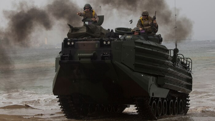 Marines with 4th Assault Amphibian battalion drive an amphibious assault vehicle during a simulated amphibious assault at Peninsula Express 15-8 on Dogu Beach, July 3, 2015. Peninsula Express is the eighth iteration this year of the Korean-Marine Exchange Program, and the first time Marine Forces Reserve has participated in the series of exercises between the U.S. and Republic of Korea Marine Corps designed to build interoperability and tactical familiarity between partner nations.