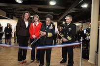 Adm. Michelle Howard, Vice Chief of Naval Operations, cuts the ribbon officially dedicating  Naval Undersea Warfare Center Division Newport's new Rapid Innovation Center during a visit April 16. With her are, from left:  Marie Bussiere, head of the Undersea Warfare Combat Systems Department, Mary Wohlgemuth, SES, division technical director, and Capt. Howard Goldman, commander of the Division.