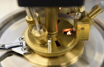 Fuels laboratory equipment at Hurlburt Field, Fla., tests the flash point of fuel received to verify ignition temperature on June 25, 2015. For every fuel delivery, fuels Airmen conduct quality control tests to ensure the Air force is receiving the proper grade and amount of fuel. (U.S. Air Force photo /Airman Kai White/Released)