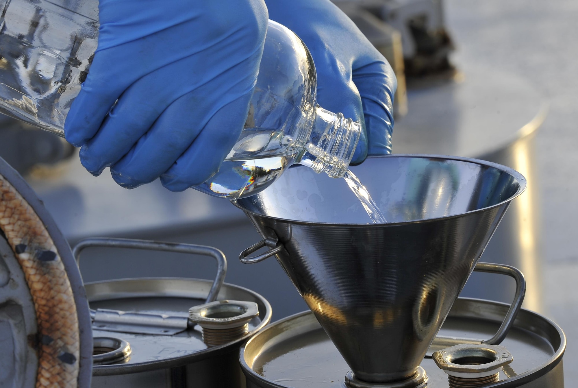 A fuel sample is stored for transportation at Hurlburt Field, Fla., June 25, 2015. For every fuel delivery, fuels Airmen conduct quality control tests to ensure the Air force is receiving the proper grade and amount of fuel. (U.S. Air Force photo /Airman Kai White/Released)