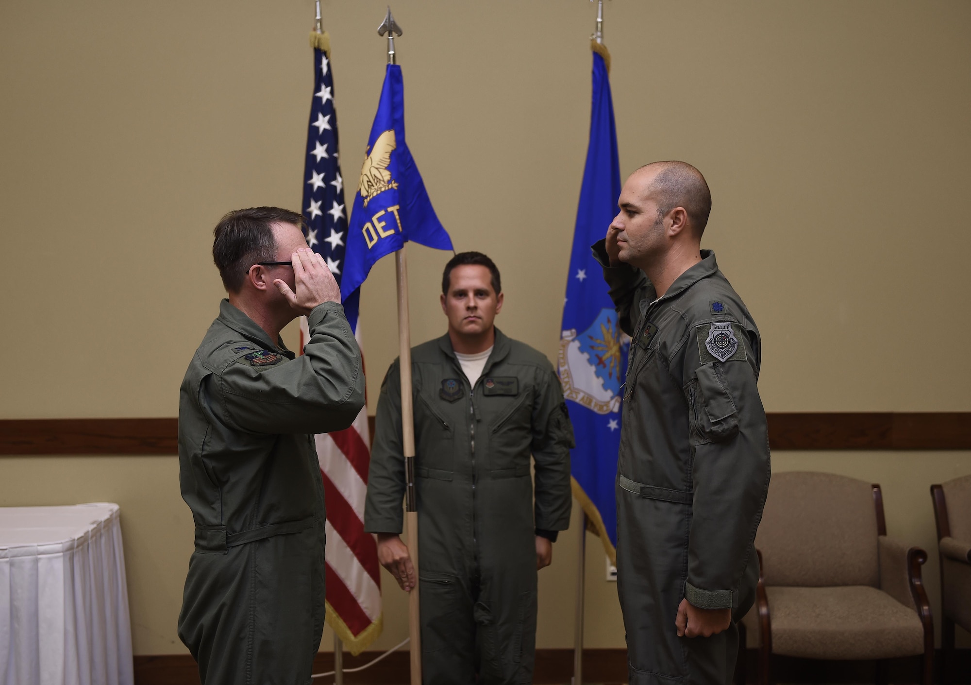 Col. Stewart Hammons, 1st Special Operations Group commander, salutes the new commander of Detachment 2, Lt. Col. Bret DeAngelis, during an activation ceremony at Hurlburt Field, Fla., July 10, 2015. DET 2 was activated to operationally test the AC-130J Ghostrider gunship, train aircrews, as well as develop new tactics, techniques and procedures for the aircraft. (U.S. Air Force photos by Airman Kai White/Released)