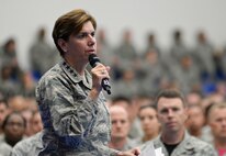 U.S. Air Force Gen. Lori Robinson, Pacific Air Forces commander, addresses Airmen during an all-call July 10, 2015, at Andersen Air Force Base, Guam. Robinson outlined her priorities including taking care of Airmen and their families while accomplishing the mission. (U.S. Air Force photo by Senior Airman Katrina M. Brisbin/Released)