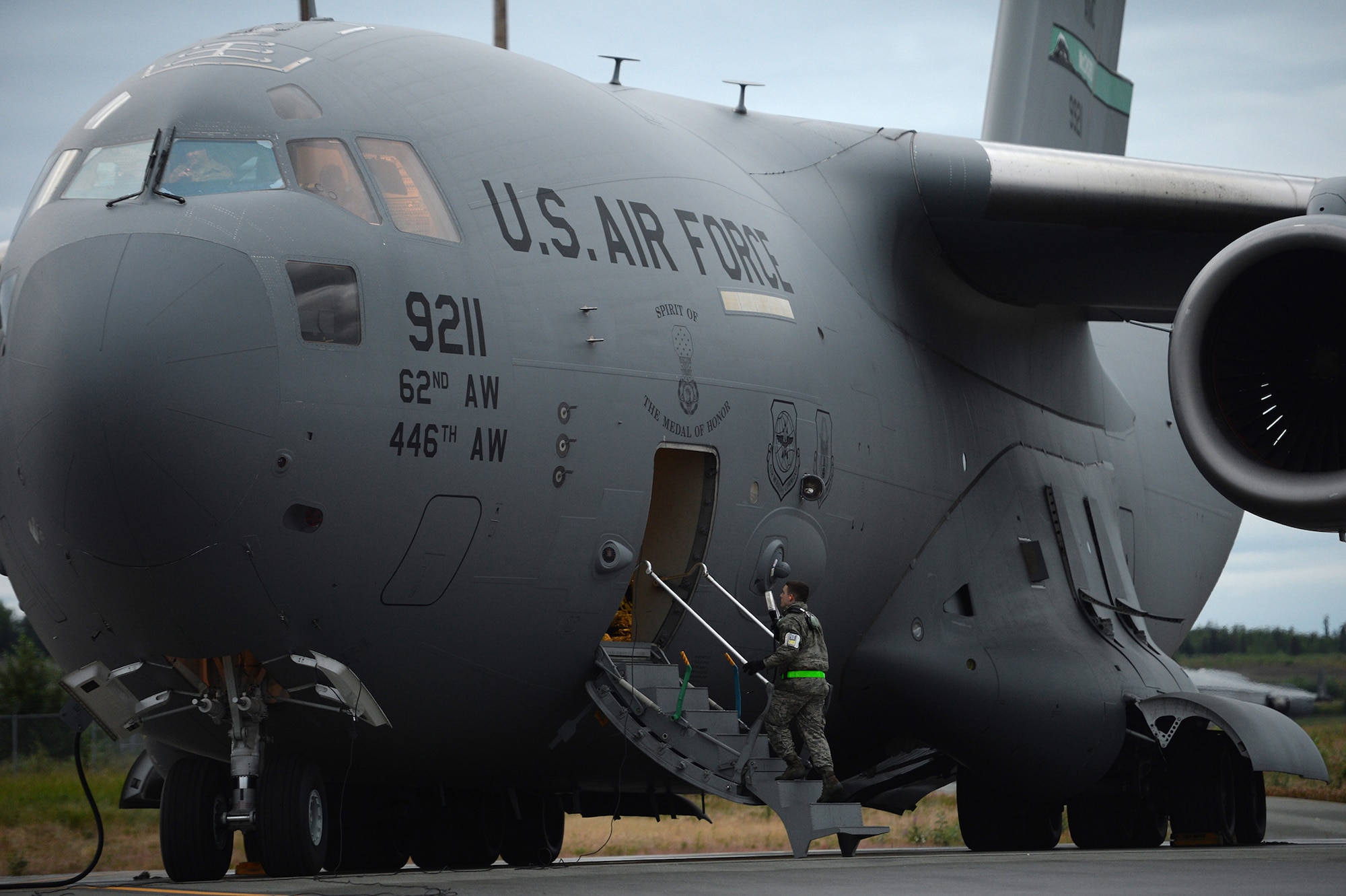 U.S. Air Force Airmen prepare a C-17 Globemaster III for an airdrop mission with U.S. Army Soldiers from 3rd Battalion, 509 infantry Brigade in support of Exercise Talisman Sabre July 7, 2015, at Joint Base Elmendorf Richardson, Alaska. Talisman Sabre 2015 is jointly sponsored by the U.S. Pacific Command and Australian Defence Force Headquarters Joint Operations Command. This was the first opportunity for Reserve pilots and loadmasters from the 446th OG to participate in the exercise, which now has six iterations. (U.S. Air Force photo by Tech. Sgt. Jason Robertson)