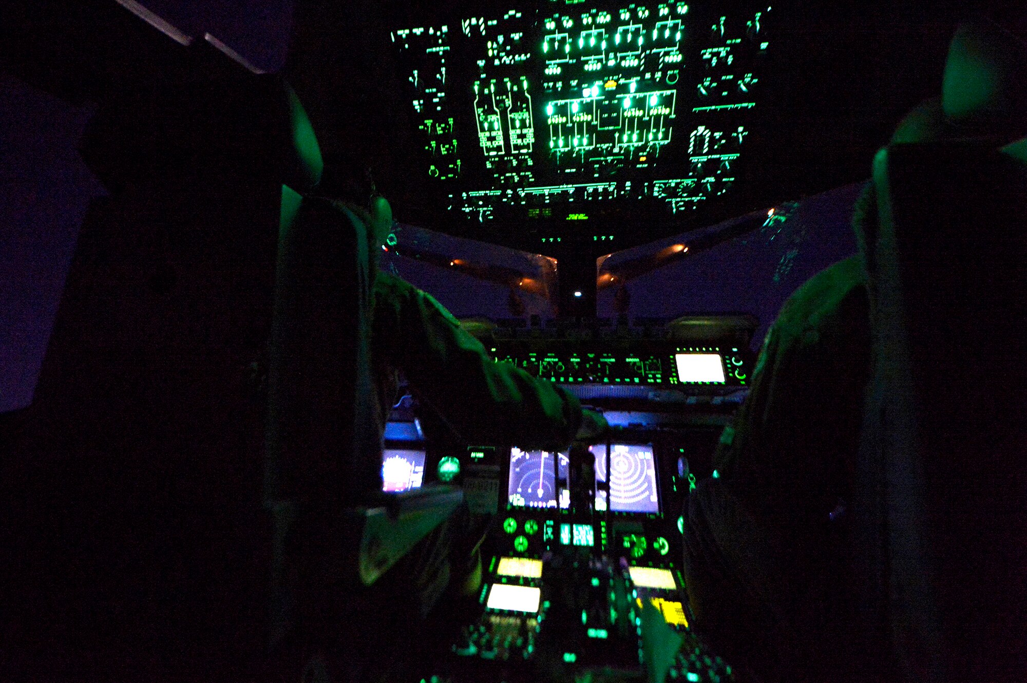Maj. Dana Dailey, 728th Airlift Squadron pilot, pilots a C-17 Globemaster III into position to conduct aerial refueling with a KC-10 Extender in support of Exercise Talisman Sabre July 7 over the Pacific Ocean. The refueling mission took place during an airdrop mission with U.S. Army Soldiers from 3rd Battalion, 509 infantry Brigade. Talisman Sabre 2015 is jointly sponsored by the U.S. Pacific Command and Australian Defence Force Headquarters Joint Operations Command. This was the first opportunity for Reserve pilots and loadmasters from the 446th OG to participate in the exercise, which now has six iterations. (U.S. Air Force photo by Tech. Sgt. Jason Robertson)