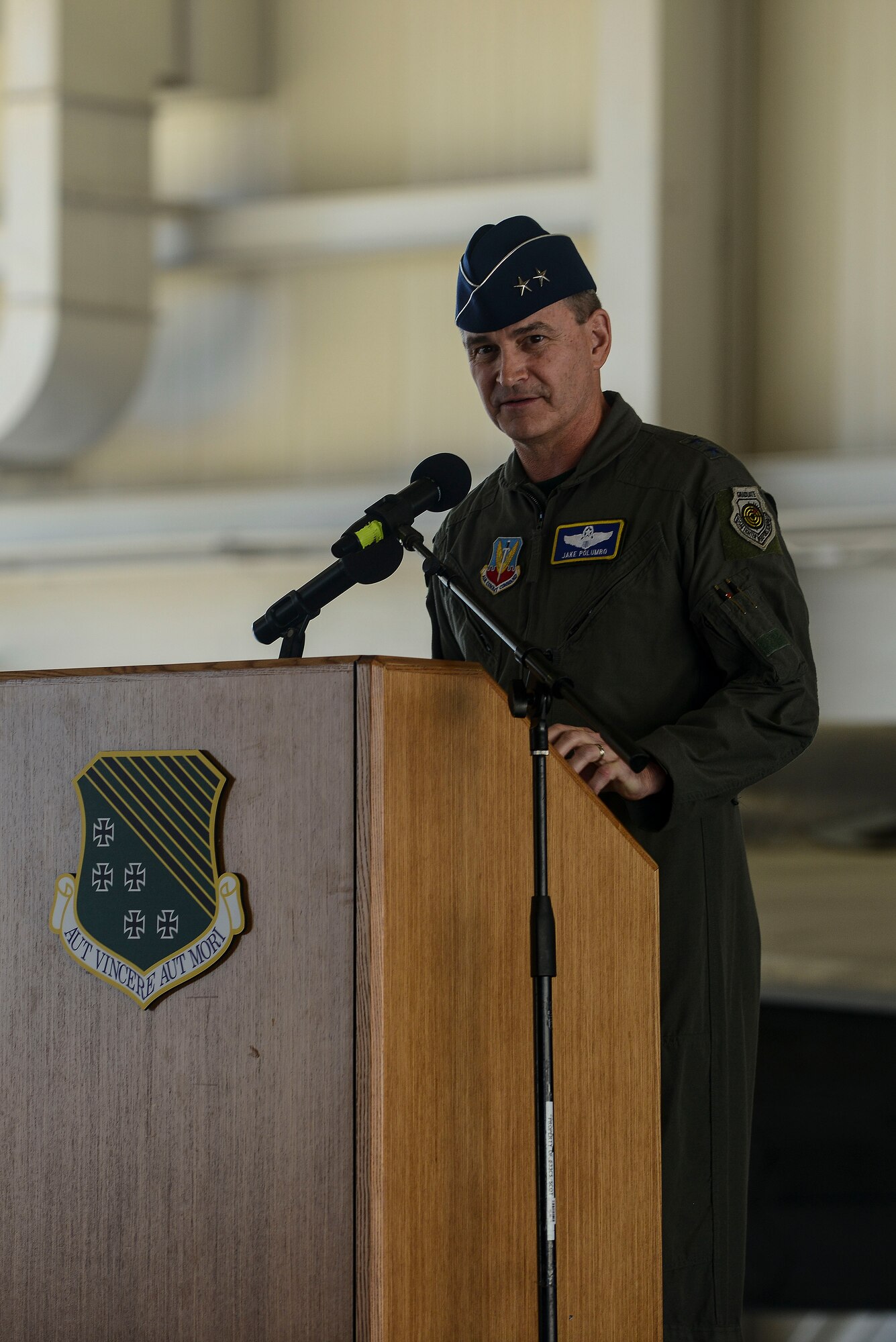 U.S. Air Force Maj. Gen. H.D. Polumbo Jr., 9th Air Force commander, speaks during the 1st Fighter Wing change of command ceremony at Langley Air Force Base, Va., July 10, 2015. Polumbo spoke about the hard work Brig. Gen. Kevin Huyck, 1st FW outgoing commander, accomplished during his time at the 1st FW, and welcomed Col. Pete Fesler, 1st FW incoming commander. (U.S. Air Force photo by Senior Airman Kimberly Nagle/Released)  
