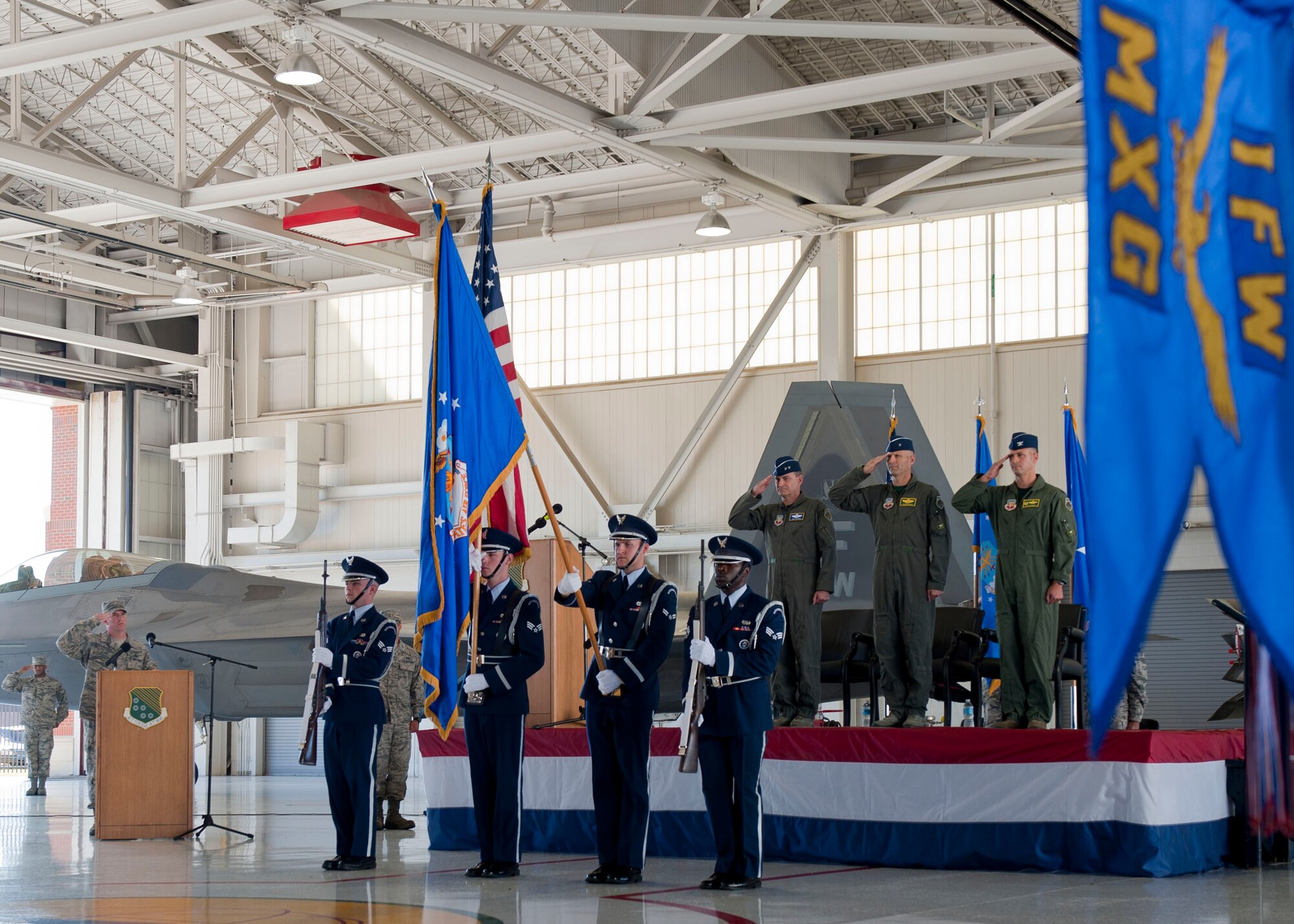 From left, U.S. Air Force Maj. Gen. H.D. Polumbo Jr., 9th Air Force commander, Brig. Gen. Kevin A. Huyck, 1st Fighter Wing outgoing commander and Col. Peter Fesler, 1st FW incoming commander salute as the Langley Honor Guard post the colors during the 1st FW change of command ceremony at Langley Air Force Base, Va., July 10, 2015. Fesler is a graduate of the U.S. Air Force Weapons School and a command pilot with more than 2,000 flying hours. (U.S. Air Force photo by Staff Sgt. John D. Strong II/Released)