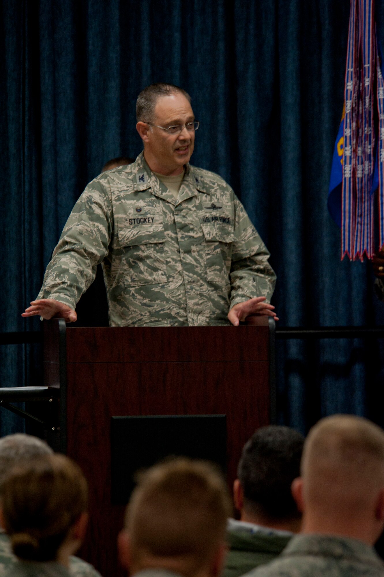 Col. David Stookey, 92nd Mission Support Group commander, addresses Airmen and thanks them for their hard work and dedication during the 92nd Security Forces Squadron change of command July 10, 2015, at Fairchild Air Force Base, Wash. The change of command ceremony is an official, formal and brief ceremony that is the military's way of bestowing command responsibility of a unit from one officer to another. (U.S. Air Force photo/Airman Sean Campbell)