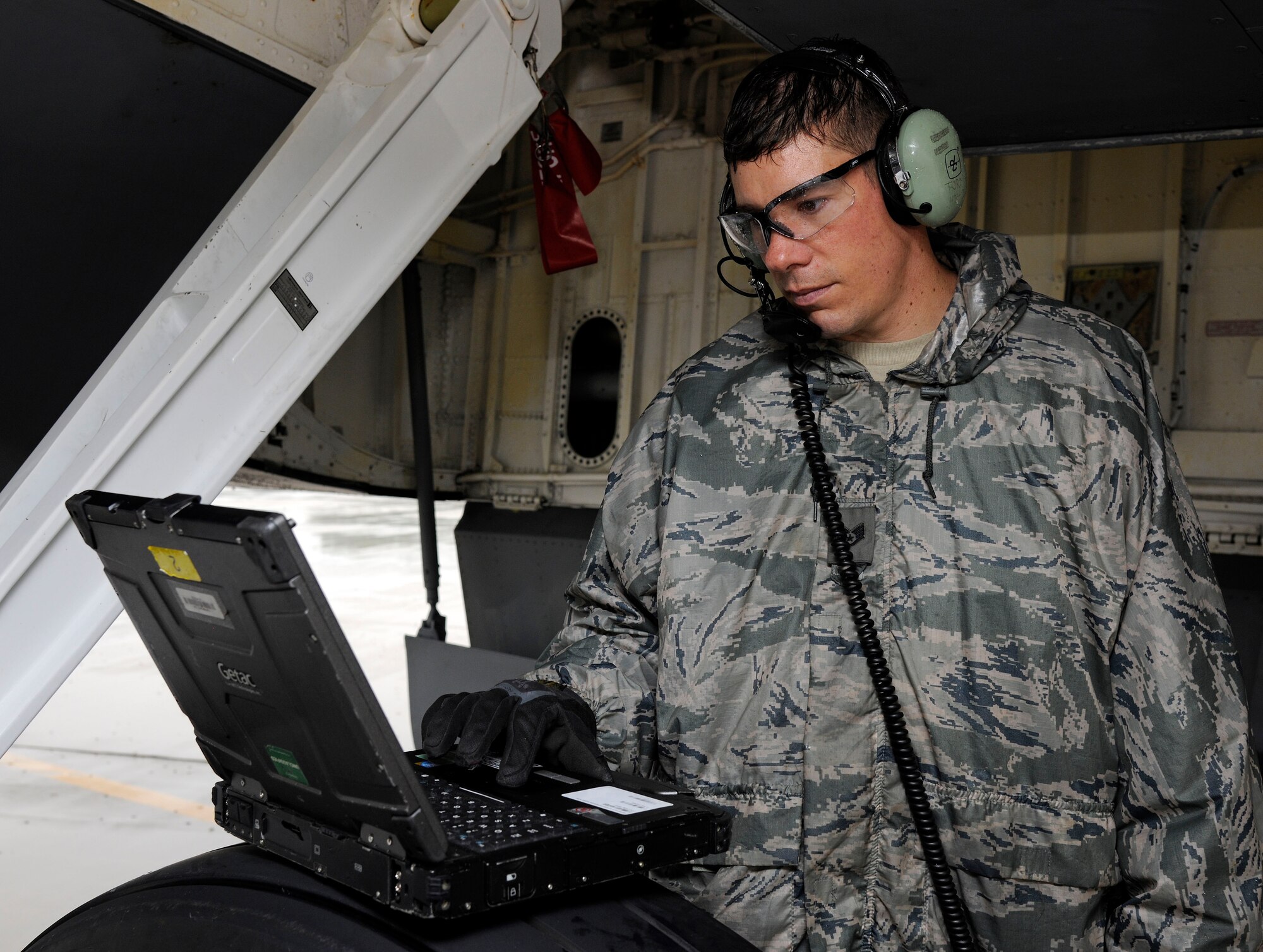 Staff Sgt. Jesse Torma, 191 Maintenance Squadron crew chief, reviews technical data for aircraft refueling on the flightline at Selfridge Air National Guard Base, Mich., July 9, 2015. Torma is refueling a KC-135 Stratotanker. On a typical day, the average load is around 40,000 pounds or 5,900 gallons of fuel. (U.S. Air National Guard Photo by Senior Airman Ryan Zeski/Released)