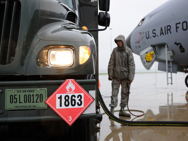 Staff Sgt. Daniel Vergun, 127th Logistics Readiness Squadron fuels technician, monitors the fuel truck gauges as he refuels a KC-135 Stratotanker on the flightline at Selfridge Air National Guard Base, Mich., July 9, 2015. The amount of fuel a jet receives is dependent on what the mission requires. On a typical day, the average load is around 40,000 pounds or 5,900 gallons of fuel. (U.S. Air National Guard Photo by Senior Airman Ryan Zeski/Released)