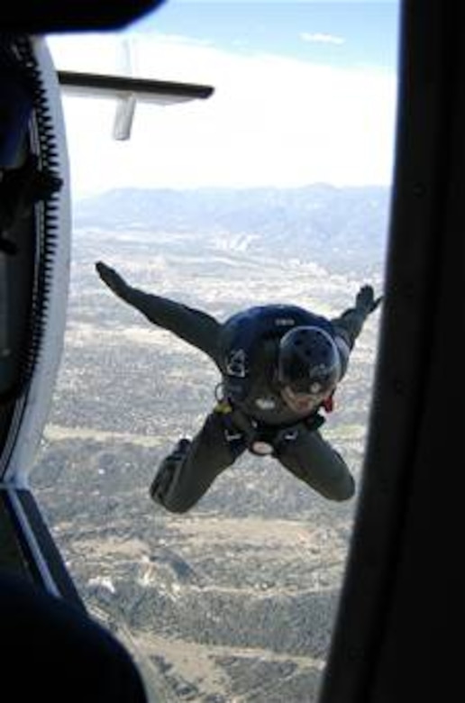 A U.S. Air Force Academy cadet departs a Twin-Otter jump plane from 4,500 feet above the academy during the during Airmanship 490 Basic Parachuting Course, an airmanship program where cadets earn their basic jump wings. (U.S. Air Force photo/Capt. Uriah Orland)