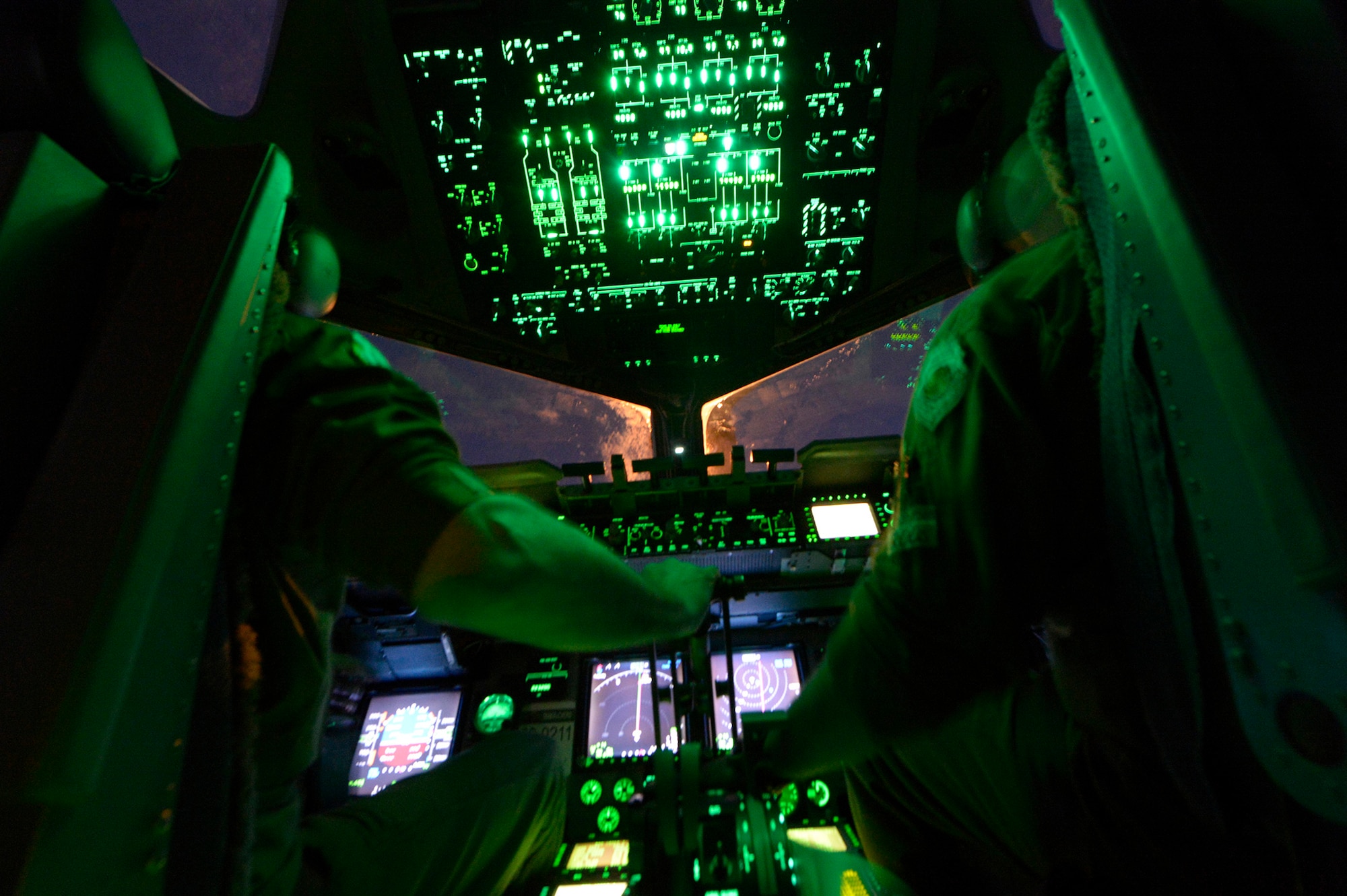 Col. Scott Snyder, 446th Operations Group commander, pilots a C-17 Globemaster III into position to conduct aerial refueling with a KC-10 Extender in support of Exercise Talisman Sabre July 7 over the Pacific Ocean. The refueling mission took place during an airdrop mission with U.S. Army Soldiers from 3rd Battalion, 509 infantry Brigade. Talisman Sabre 2015 is jointly sponsored by the U.S. Pacific Command and Australian Defence Force Headquarters Joint Operations Command. This was the first opportunity for Reserve pilots and loadmasters from the 446th OG to participate in the exercise, which now has six iterations. (U.S. Air Force photo by Tech. Sgt. Jason Robertson)