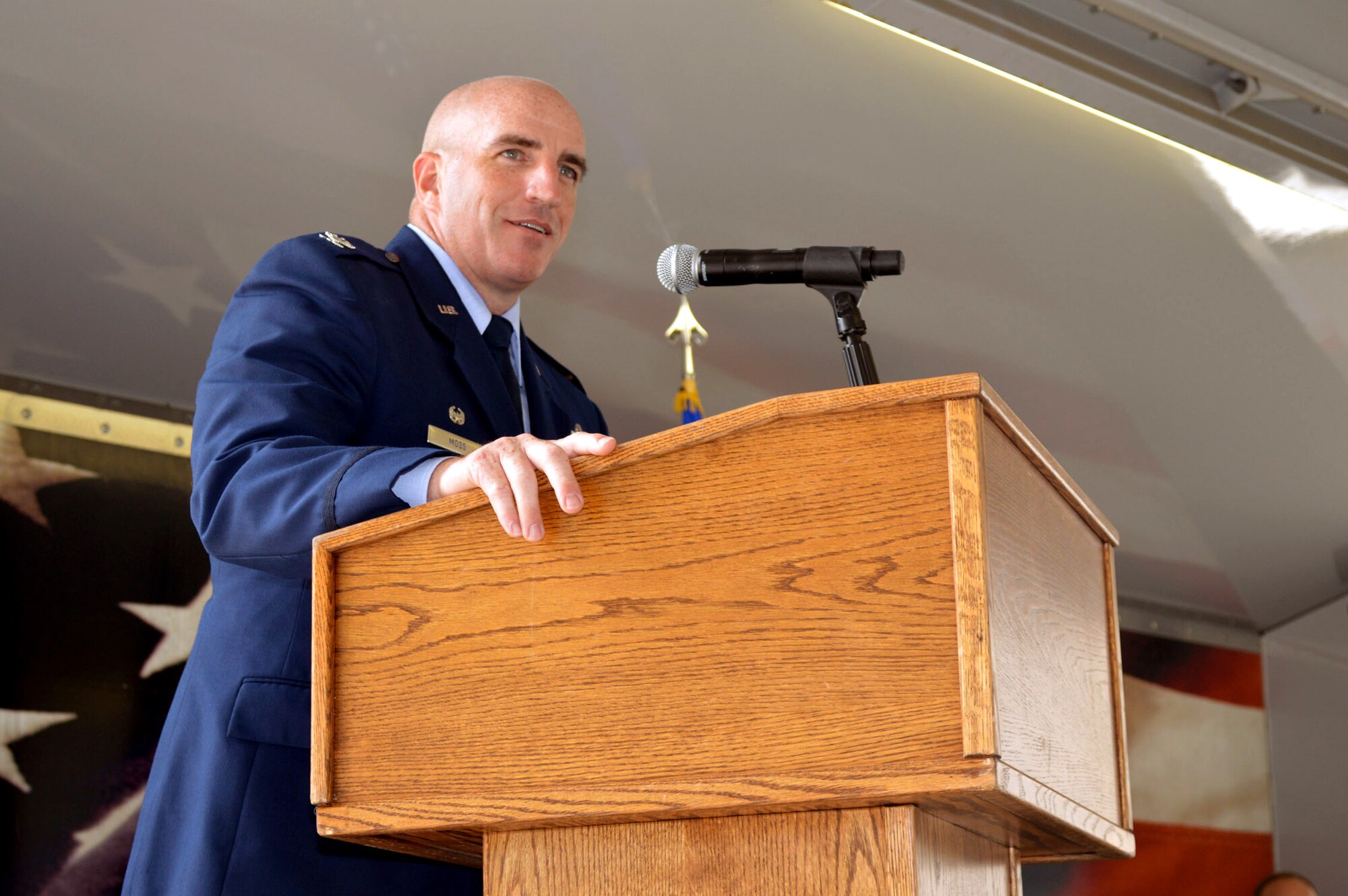 Col. Kenneth Moss, 43rd Airlift Group commander, addresses attendees during the 43rd Air Mobility Squadron activation ceremony July 1, 2015, at Pope Army Airfield, North Carolina. Aircraft maintenance and aerial port Airmen and functions transferred to the newly established 43rd AMS from the inactivated 3rd Aerial Port Squadron and the 43rd Aircraft Maintenance Squadron. (U.S. Air Force photo/Marvin Krause)