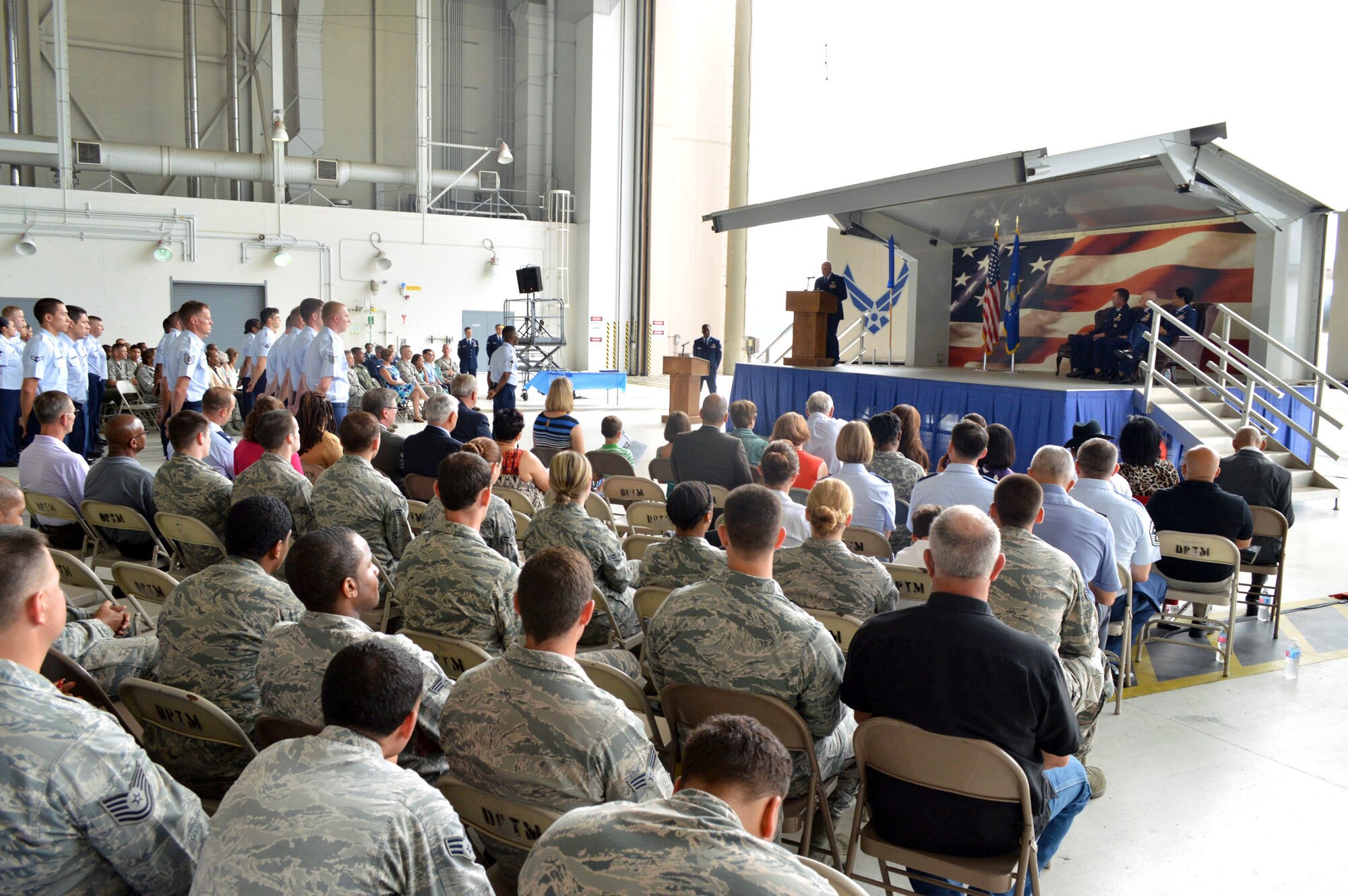 Col. Kenneth Moss, 43rd Airlift Group commander, addresses attendees during the 43rd Air Base Squadron redesignation and change of command ceremony July 1, 2015, at Pope Army Airfield, North Carolina. Logistics and force support Airmen and functions transferred to the newly established 43rd ABS from the inactivated 43rd Logistics Readiness Squadron and the 43rd Force Support Squadron. (U.S. Air Force photo/Marvin Krause)