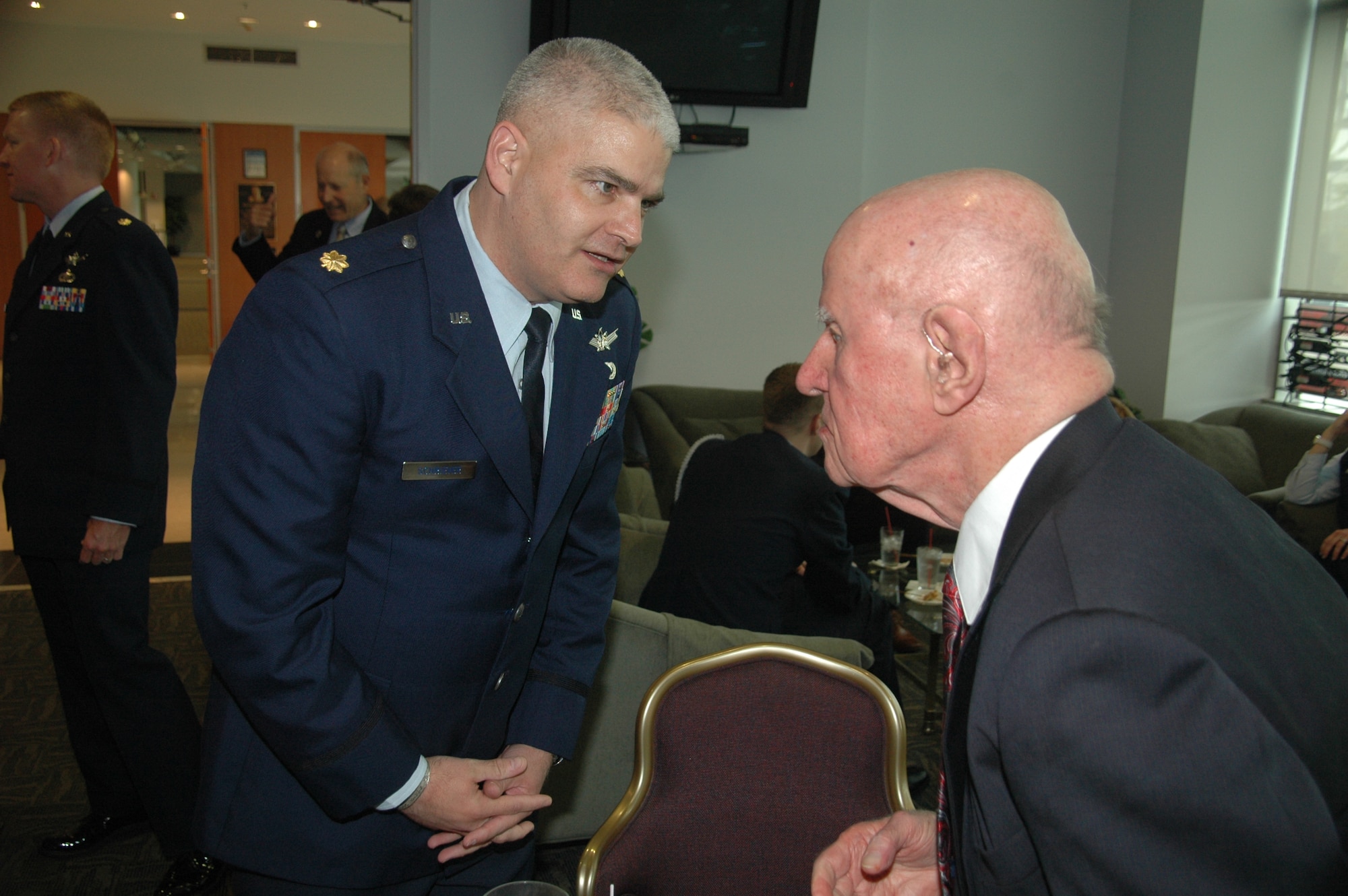 Maj. Michael Schriever meets with 94-year-old retired Col. Thomas Haig, one of six early Air Force and civilian space pioneers whose newly inscribed names were unveiled at the General Bernard A. Schriever Memorial located on the grounds of the Space and Missile Systems Center at Los Angeles Air Force Base in El Segundo, Calif. Maj. Schriever is the  grandson of General Schriever and chief of the National Reconnaissance Office headquarters Weapons and Tactics and deputy chief of NRO Special Technical Operations. Col. Haig managed requirements for satellite ground support at the Air Force Ballistic Missile Division until 1961, developing tracking and control stations for early surveillance programs. When the National Reconnaissance Office established a meteorological satellite program to provide information on cloud cover over the Soviet Union for its Corona photographic reconnaissance satellites, Haig created and managed the Defense Meteorological Satellite Program for the NRO. (U.S. Air Force photo/James Spellman, Jr.)