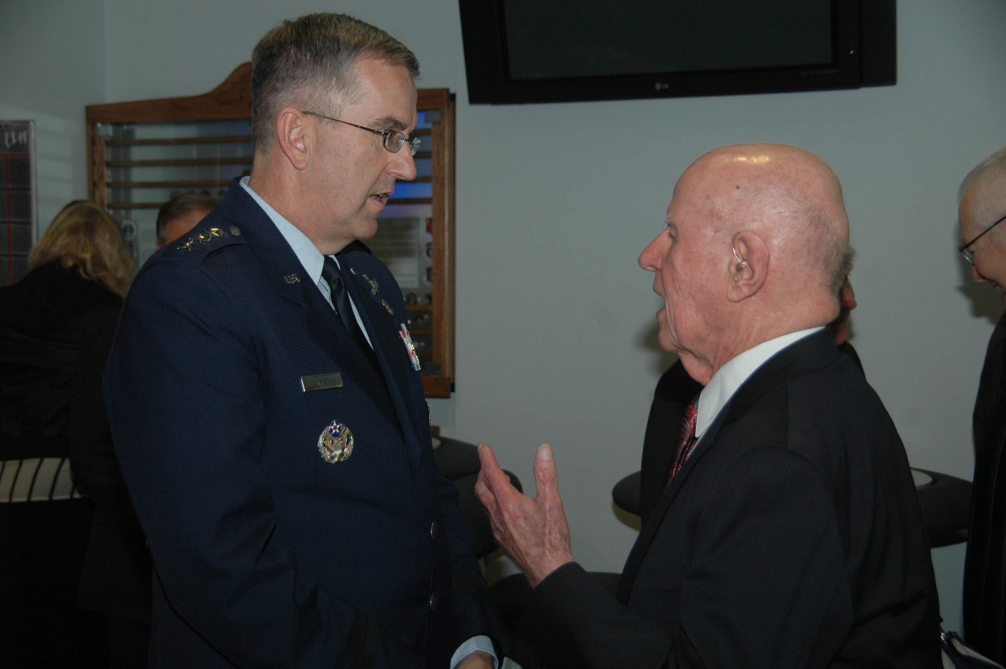 Gen. John Hyten, commander, Air Force Space Command, Peterson Air Force Base, Colo. talks with 94-year-old retired Col. Thomas Haig, one of six early Air Force and civilian space pioneers whose newly inscribed names were unveiled at the General Bernard A. Schriever Memorial located on the grounds of the Space and Missile Systems Center at Los Angeles Air Force Base in El Segundo, Calif. Col. Haig managed requirements for satellite ground support at the Air Force Ballistic Missile Division until 1961, developing tracking and control stations for early surveillance programs. When the National Reconnaissance Office established a meteorological satellite program to provide information on cloud cover over the Soviet Union for its Corona photographic reconnaissance satellites, Haig created and managed the Defense Meteorological Satellite Program for the NRO. (U.S. Air Force photo/James Spellman, Jr.)