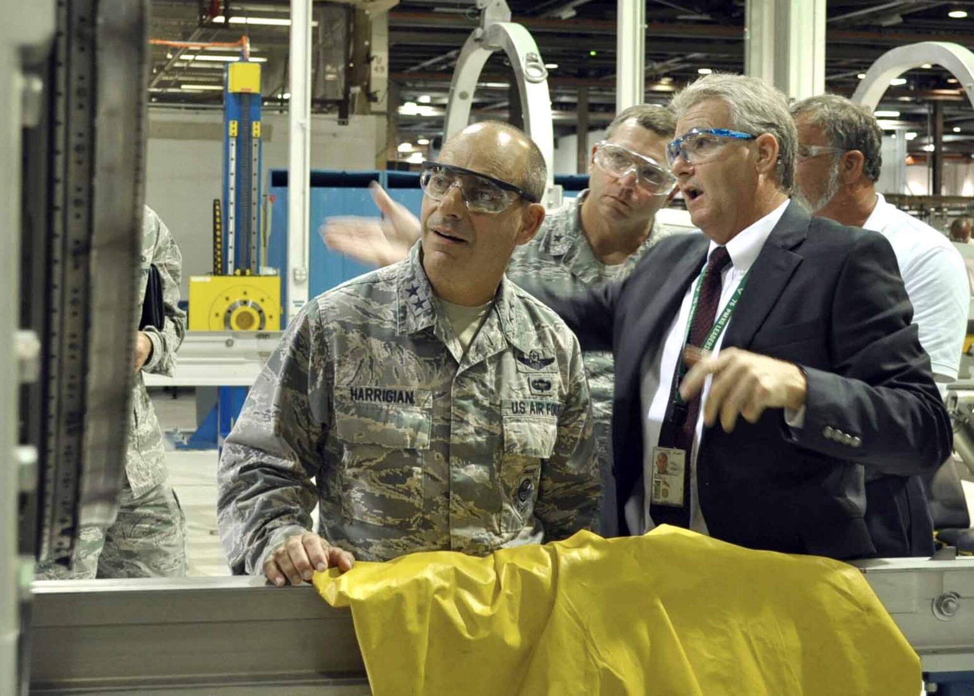 Mike Opela, 544th Propulsion Maintenence Squadron Director discusses the process of modifying a Marine STOVL F135 engine with Major General Jeffrey L. Harrigian, Director of the Headquarters US Air Force F-35 Integration Office during a visit to the Air Force Sustainment Center and Oklahoma City Air Logistics Complex where the modification is performed. (U.S. Air Force photo/Marlin Zimmerman)
