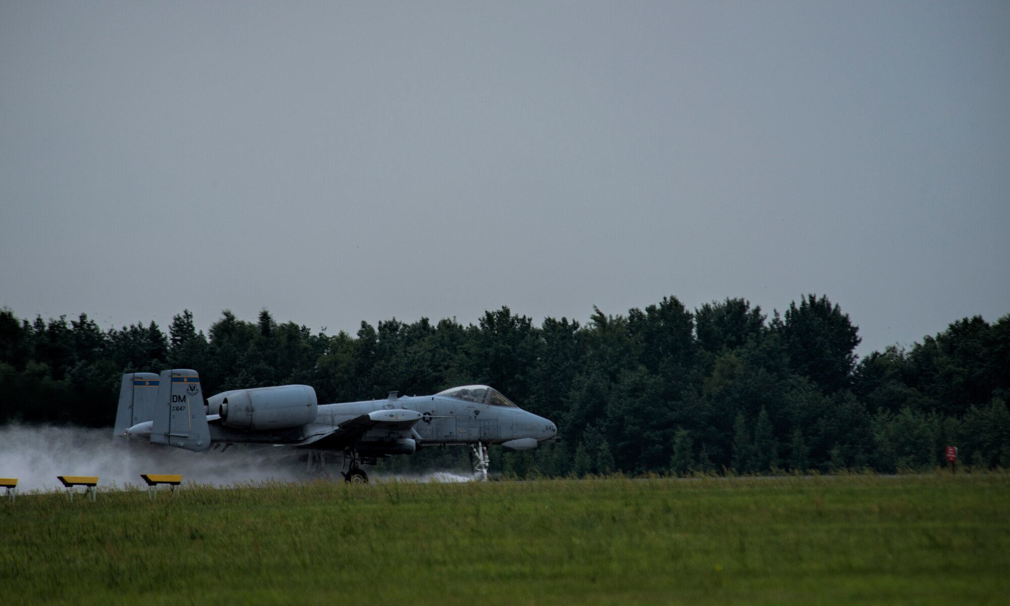 A U.S. Air Force A-10 Thunderbolt II attack aircraft pilot assigned to the 354th Expeditionary Fighter Squadron takes off from the flightline during a theater security package deployment at Lask Air Base, Poland, July 9, 2015. The A-10 supports U.S. Air Force missions around the world as part of its current inventory of strike platforms, including F-15 Eagle and F-16 Fighting Falcon fighter aircraft as part of the TSP. (U.S. Air Force photo by Staff Sgt. Christopher Ruano/Released)