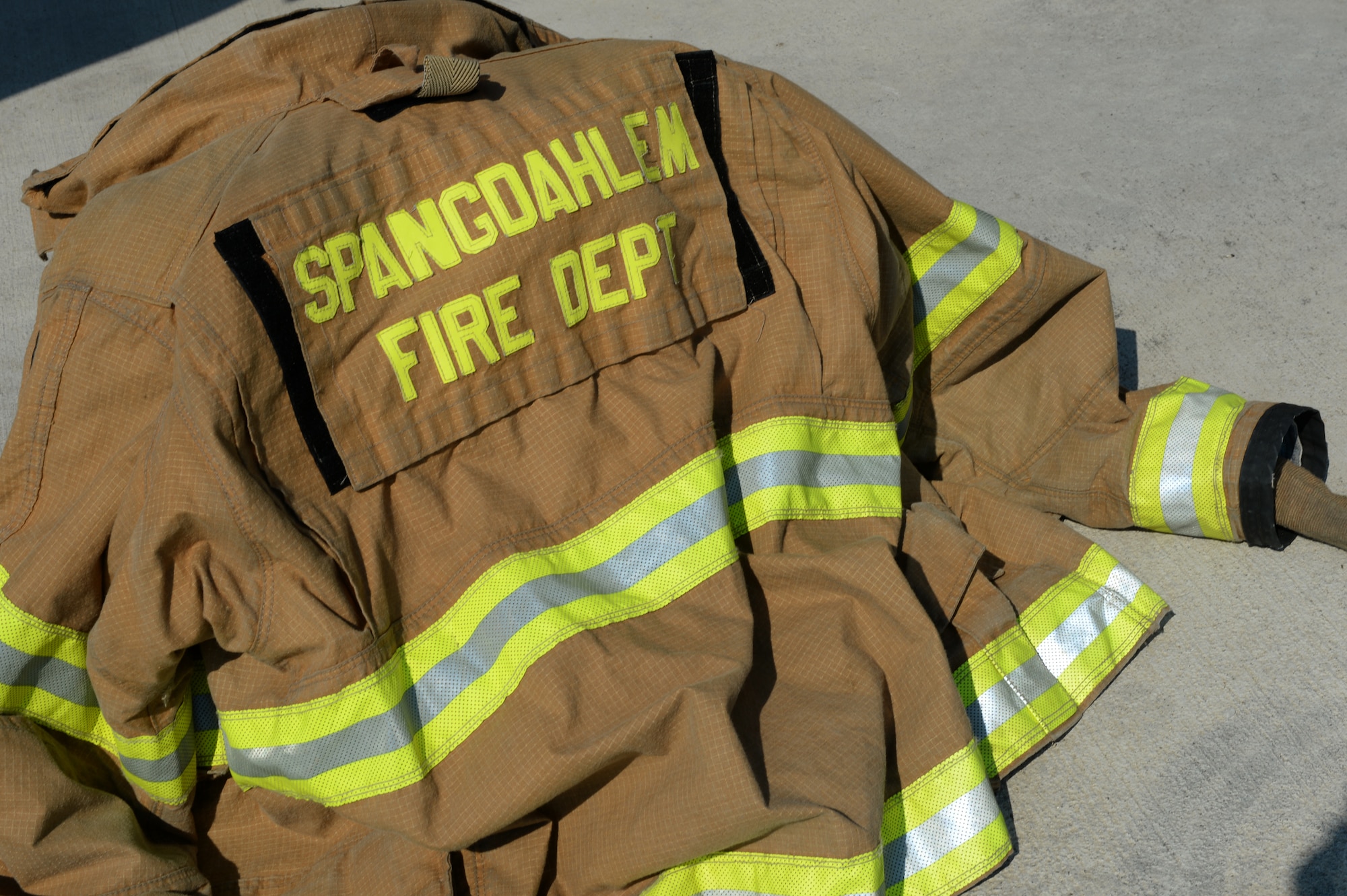 A U.S. Air Force fire protection structural jacket is displayed on the flightline during a theater security package July 8, 2015, at Campia Turzii, Romania. The structural jacket provides protection from thermal environments during a firefight. (U.S. Air Force photo by Senior Airman Dylan Nuckolls/Released)