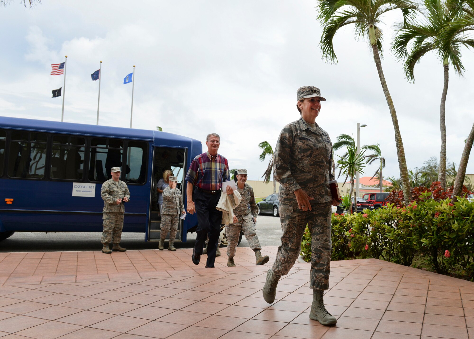 U.S. Air Force Gen. Lori Robinson, Pacific Air Forces commander, and her spouse retired U.S. Air Force Maj. Gen. David Robinson, visit 36th Wing headquarters, July 9, 2015, Andersen Air Force Base, Guam. Robinson visited the island to share her senior leader perspective about the importance of continuous bomber presence and forward-positioned role Andersen Airmen play in maintaining stability in the Indo-Asia Pacific region. (U.S. Air Force photo by Senior Airman Alexander W. Riedel/Released)