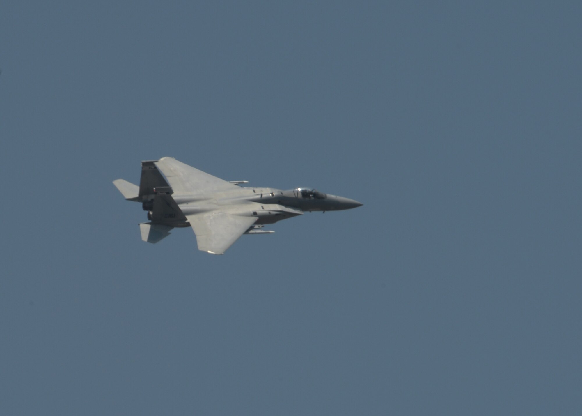 A U.S. Air National Guard F-15C Eagle fighter aircraft assigned to the 123rd Expeditionary Fighter Squadron flies over the flightline during a theater security package deployment July 7, 2015, at Campia Turzii, Romania. More than 200 Airmen from the 142nd Fighter Wing, Oregon Air National Guard, Portland, Oregon, started training with the Romanian air force as part of a European theater security package of F-15C Eagles deployed to Romania. (U.S. Air Force photo by Senior Airman Dylan Nuckolls/Released)