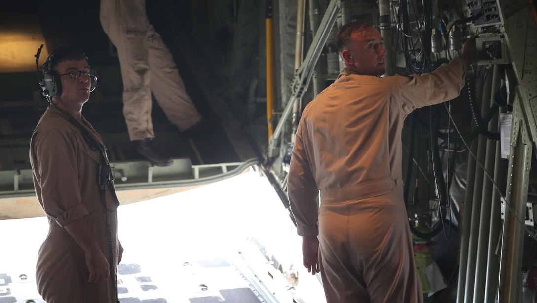 Marines with Marine Aerial Refueler Transport Squadron (VMGR) 352 prepare the KC-130J Super Hercules for a parachute drop at Marine Corps Air Station Camp Pendleton, California, July 8. Marines with VMGR-352 supported the 1st Radio Battalion, I Marine Expeditionary Unit. 