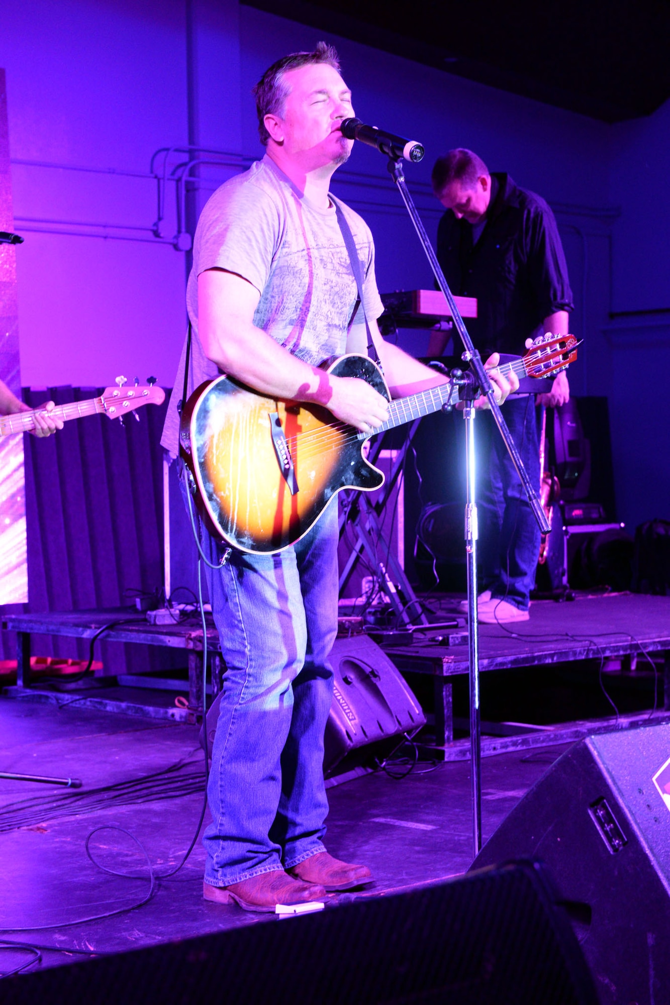 Edwin McCain, rock musician, performs at the Sunrise Conference Center July 10, 2015, at Andersen Air Force Base, Guam. The free event provided service members and families an opportunity to break from their daily routine to enjoy music from popular recording artists. (U.S. Air Force photo by Airman 1st Class Joshua Smoot/Released)