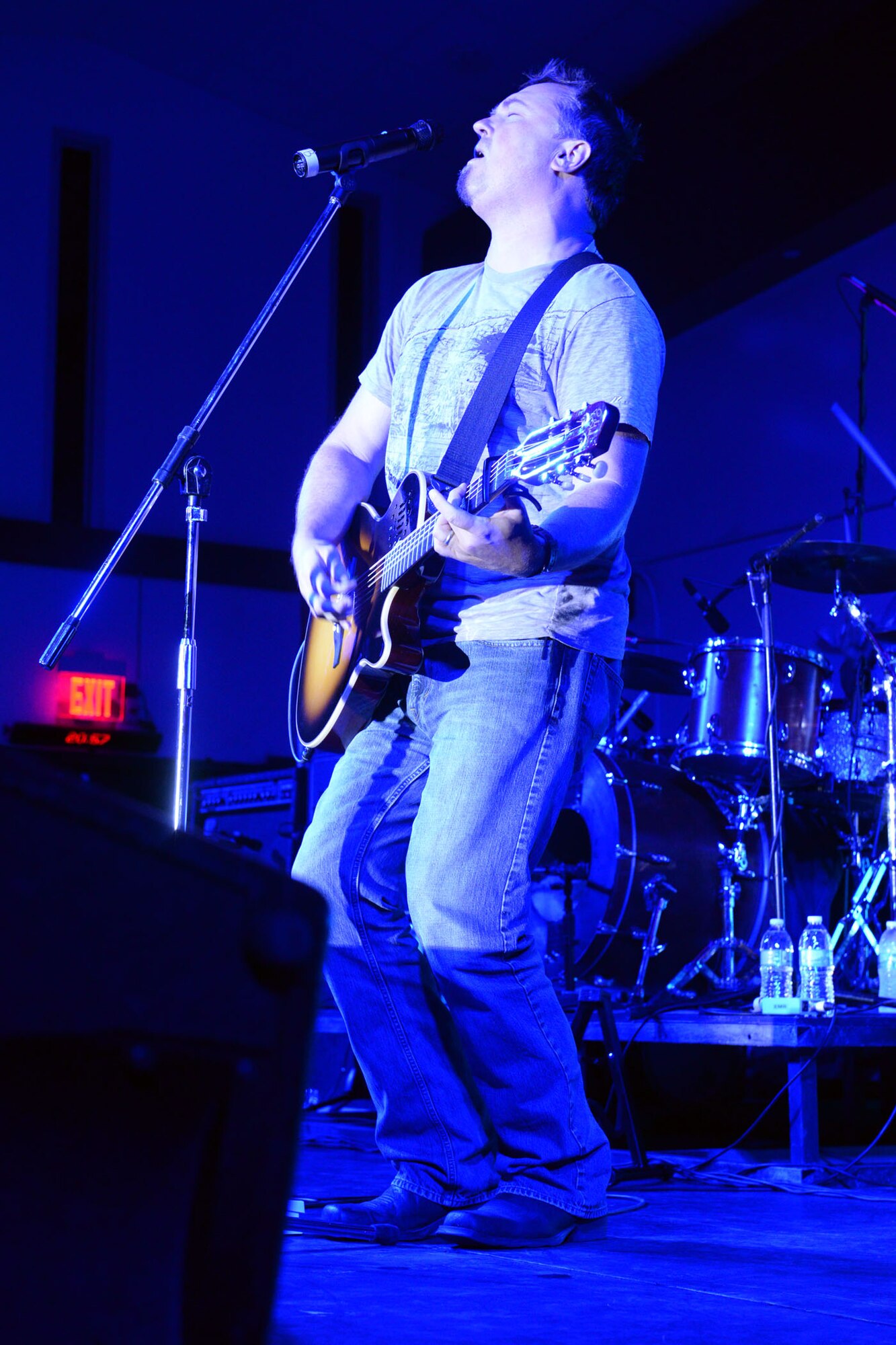 Edwin McCain, rock musician, performs at the Sunrise Conference Center July 10, 2015, at Andersen Air Force Base, Guam. The free event provided service members and families an opportunity to break from their daily routine to enjoy music from popular recording artists. (U.S. Air Force photo by Airman 1st Class Joshua Smoot/Released)