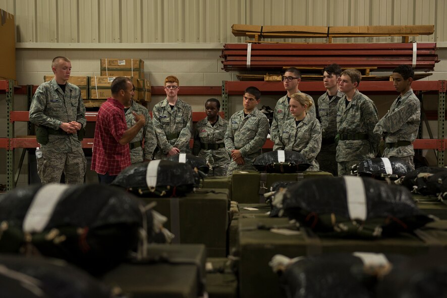 Junior cadets learn about the types of cargo the C-145’s drop on missions during the ROTC Summer Leadership School July 7 at Duke Field, Fla.  50 cadets participated in the voluntary SLS program that teaches high school junior ROTC cadets, leadership, teamwork and self confidence in a highly structured and focused environment.  (Air Force photo/Tech. Sgt. Jasmin Taylor)