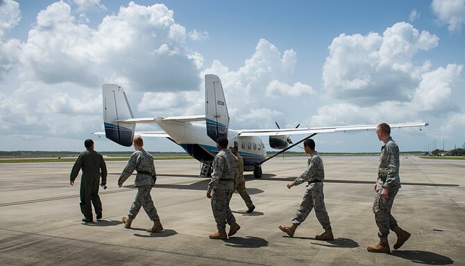 Lt. Col. Scott Porterfield, 919th Special Operations Support Squadron, leads the junior cadets to their incentive flight during the ROTC Summer Leadership School July 7 at Duke Field, Fla.  50 cadets participated in the voluntary SLS program that teaches high school junior ROTC cadets, leadership, teamwork and self confidence in a highly structured and focused environment. (Air Force photo/Tech. Sgt. Jasmin Taylor)
