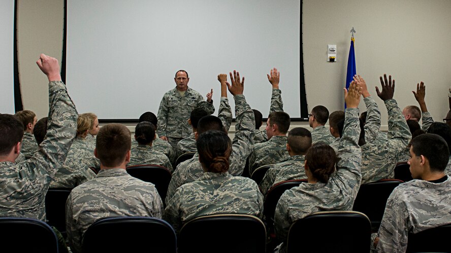 Col. Kurt Matthews, 919th Special Operations Group commander, ask the cadets which high schools they are visiting from during the ROTC Summer Leadership School July 7 at Duke Field, Fla.  50 cadets participated in the voluntary SLS program that teaches high school junior ROTC cadets, leadership, teamwork and self confidence in a highly structured and focused environment. (Air Force photo/Tech. Sgt. Jasmin Taylor)