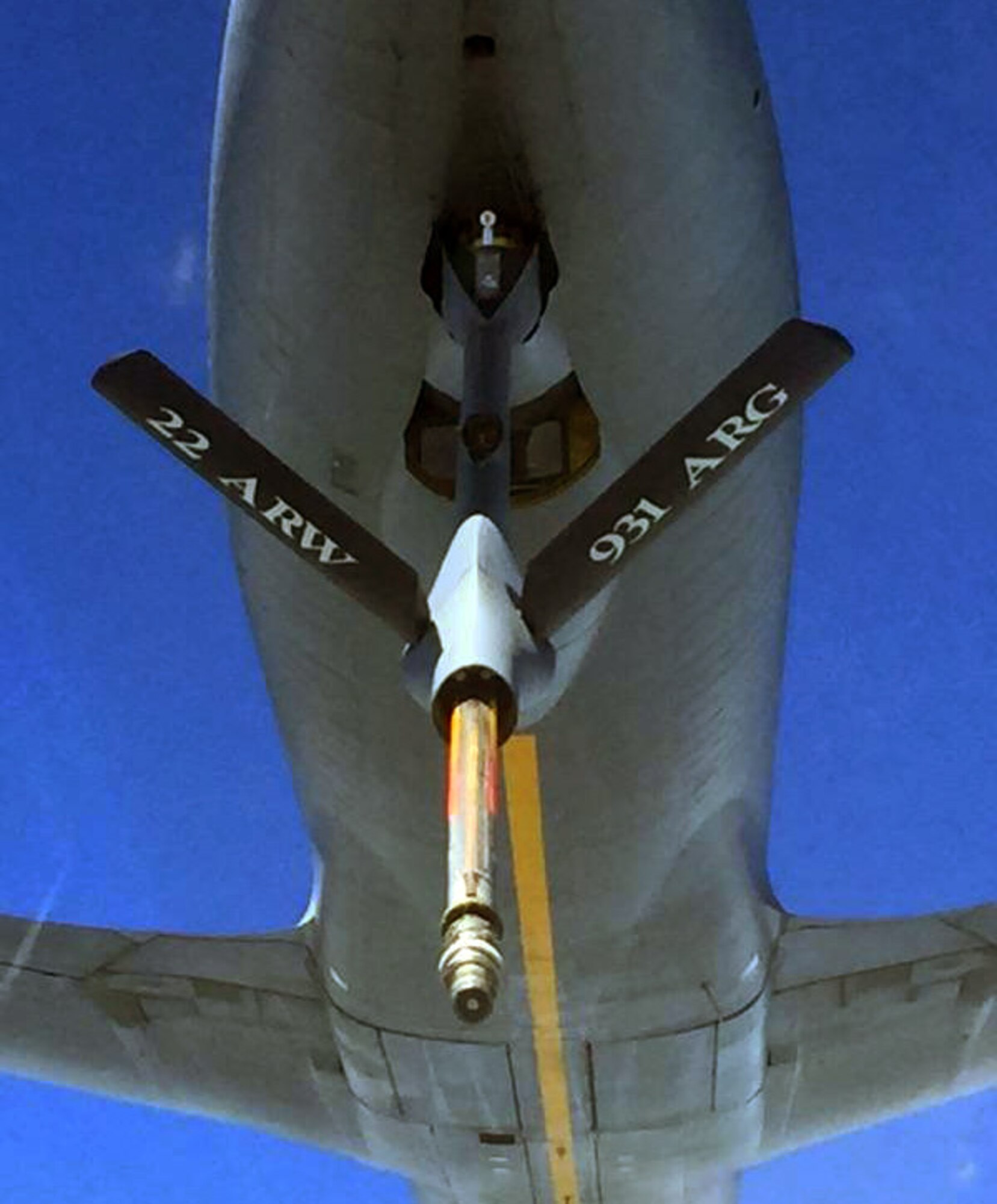 The air refueling boom of a McConnell Air Force Base KC-135 Stratotanker extends toward a receiving aircraft during an air refueling training exercise, July 11, 2015.  The exercise was part of receiver/tanker training being performed by members of the Air Force Reserve 18th Air Refueling Squadron at McConnell.  This training ensures pilots in the squadron are qualified to serve as both refueling and receiving aircraft during missions, and is essential for the eventual transition to the new KC-46A Pegasus tanker at McConnell.  (U.S. Air Force photo by Senior Master Sgt. Ray Lewis)