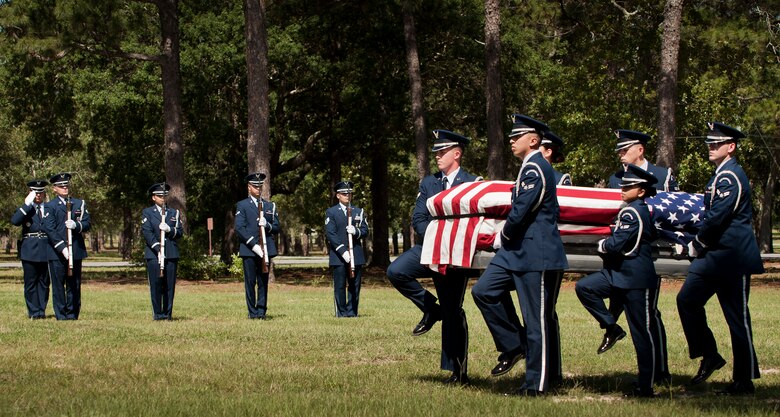 Members of the Eglin Air Force Base Honor Guard carry a casket during the unit’s recent graduation ceremony. Approximately 12 new Airmen graduated from the 80-plus-hour course. The graduation performance includes flag detail, rifle volley, pall bearers and bugler for friends, family and unit commanders. The Eglin Honor Guard provides their services to the base, Duke Field and more than 20 area counties making up approximately 20,000 square miles in the Florida and Alabama region.  (U.S. Air Force photo/Tech. Sgt. Sam King)