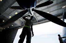 Airman Mario Hill, 919th Special Operations Maintenance Group, checks the intake of an engine on a C-145 June 6 at Duke Field, Fla. The 919th SOMXG is comprised of 919th SOMXS, 919th SOAMXS, 919th SOMOF, and the 592nd SOAMXS. Their primary mission is the maintenance of the C-145 aircraft. (U.S. Air Force photo/Tech. Sgt. Sam King)
