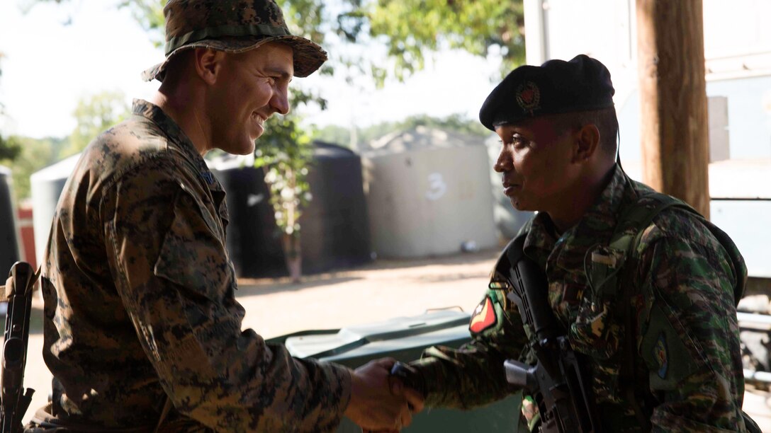 U.S. Marine Corps Cpl. Cason Cunningham, a machine gun squad leader with Company A, 1st Battalion, 4th Marine Regiment, Marine Rotational Force – Darwin, congratulates a Timor-Leste Defence Force member for excelling in room-clearing operations during Exercise Koa Moana 15.2 in Dili, Timor-Leste, June 24. The Marines conducted a bilateral exercise with one platoon of the Timor-Leste Defence Force’s land component of the naval force and one platoon of their Marines, focusing on the fundamentals of squad and platoon-level tasks. The bilateral training exercise allows the Marines to share their tactics, techniques and procedures with our international partner, strengthening our understanding of each other’s Defence forces standard operating procedures. 