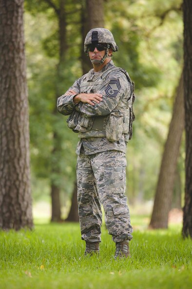Chief Master Sgt. Rob Grimsley stands wearing his assault gear after earning an Army Air Assault Badge recently.  (U.S. Photo by 2nd Lt. Rashard Coaxum)