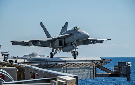 TIMOR SEA (July 7, 2015) An F/A-18E Super Hornet from the Eagles of Strike Fighter Squadron (VFA) 115 launches from the flight deck of the Nimitz-class aircraft carrier USS George Washington (CVN 73) during Talisman Sabre 2015. Talisman Sabre is a bilateral training exercise intended to maintain a high level of interoperability between U.S. and Australian forces. 