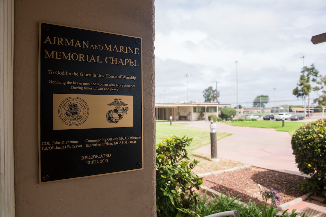 A rededication plaque hangs at the entrance of the Airman and Memorial Chapel aboard Marine Corps Air Station Miramar, California, July 12. The plaque is displayed across from the original dedication plaque for the Airman Memorial Chapel in 1957.  (U.S. Marine Corps photo by Cpl. Alissa P. Schuning/Released)