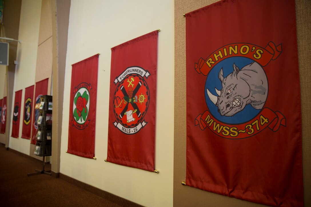 Unit flags line the walls of the Airman and Marine Memorial Chapel aboard Marine Corps Air Station Miramar, California, July 12. The flags are part of many new additions made to the chapel over the last three years as a reminder to pray for the units that are deployed. (U.S. Marine Corps photo by Cpl. Alissa P. Schuning/Released)