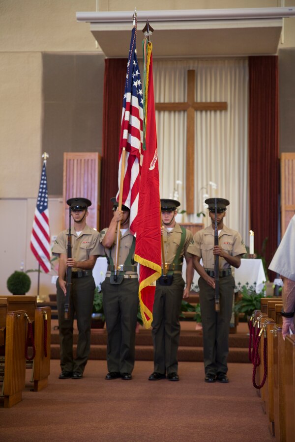 The Marine Corps Air Station Miramar Color Guard presents the colors during the rededication ceremony at the Airman and Marine Memorial Chapel aboard MCAS Miramar, California, July 12. The chapel underwent a three-year renovation culminating in the rededication ceremony.  (U.S. Marine Corps photo by Cpl. Alissa P. Schuning/Released)