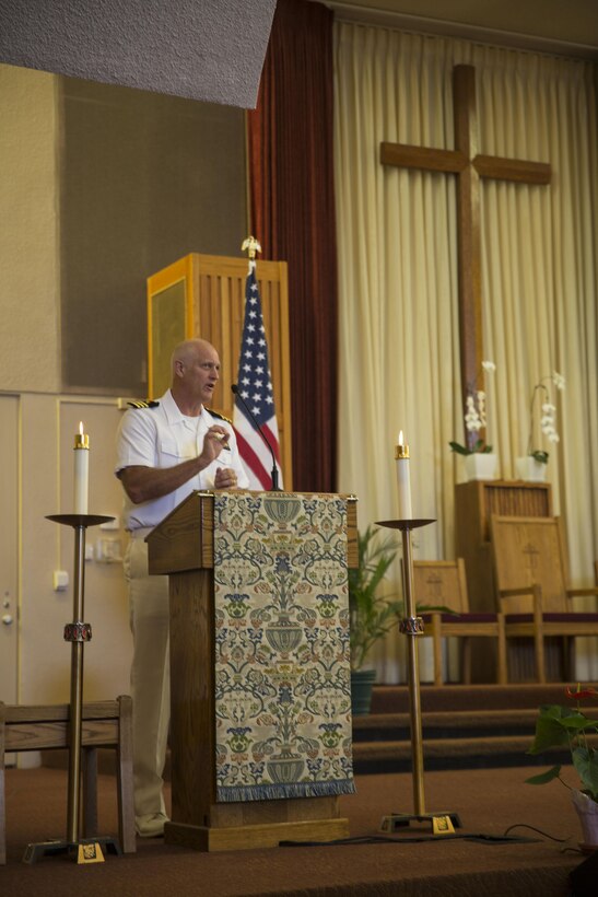 Navy Cmdr. Bob Freiberg, command chaplain for Marine Corps Air Station Miramar and a Minnetonka, Minnesota, native, speaks during a rededication ceremony at the Airman and Marine Memorial Chapel aboard MCAS Miramar, California, July 12. The chapel underwent a three-year renovation culminating in the rededication ceremony.  (U.S. Marine Corps photo by Cpl. Alissa P. Schuning/Released)