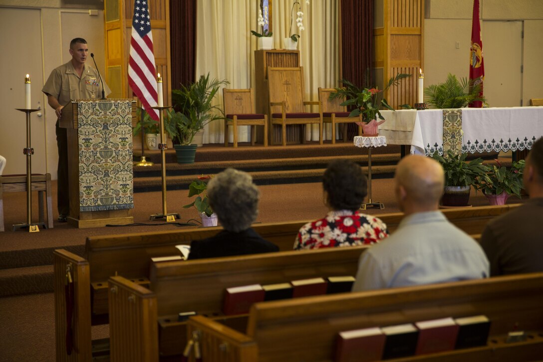 Col. John P. Farnam, commanding officer of Marine Corps Air Station Miramar, speaks during a rededication ceremony at the Airman and Marine Memorial Chapel aboard MCAS Miramar, California, July 12. The chapel underwent a three-year renovation culminating in the rededication ceremony. (U.S. Marine Corps photo by Cpl. Alissa P. Schuning/Released)