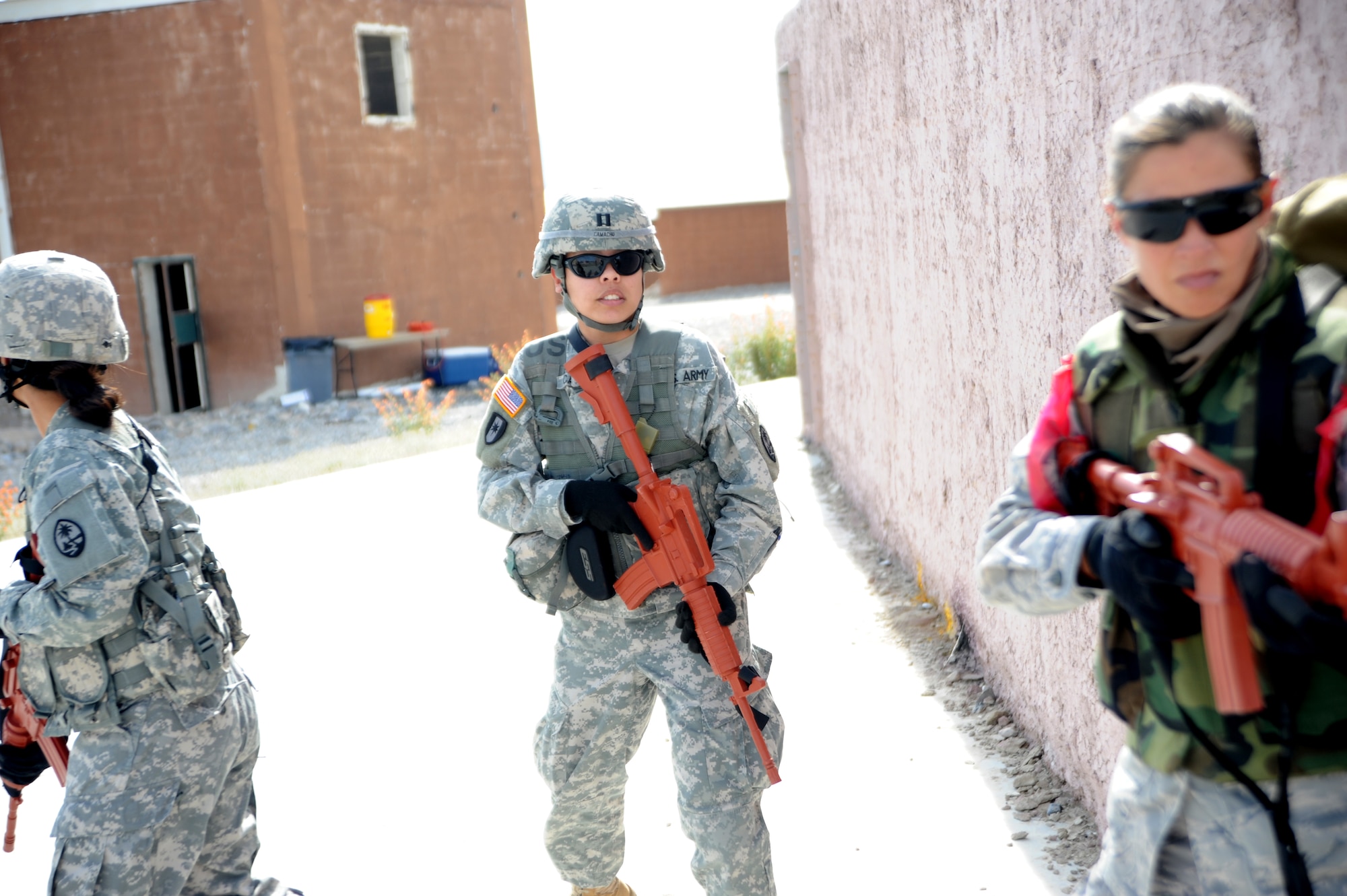 Guam Army National Guard medical detachment soldiers clear buildings during the Operation Joint Medic training exercise