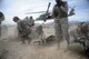 Independent duty medical technicians take cover and ready patients for medical evacuation during the Operation Joint Medic training exercise